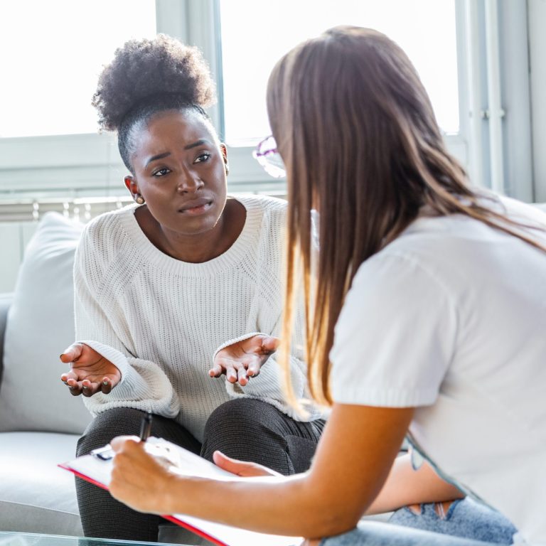 Psychological Evaluations For T-Visa Applicants (I-914) 1 doctor having discussion with patient scaled e1735318423960