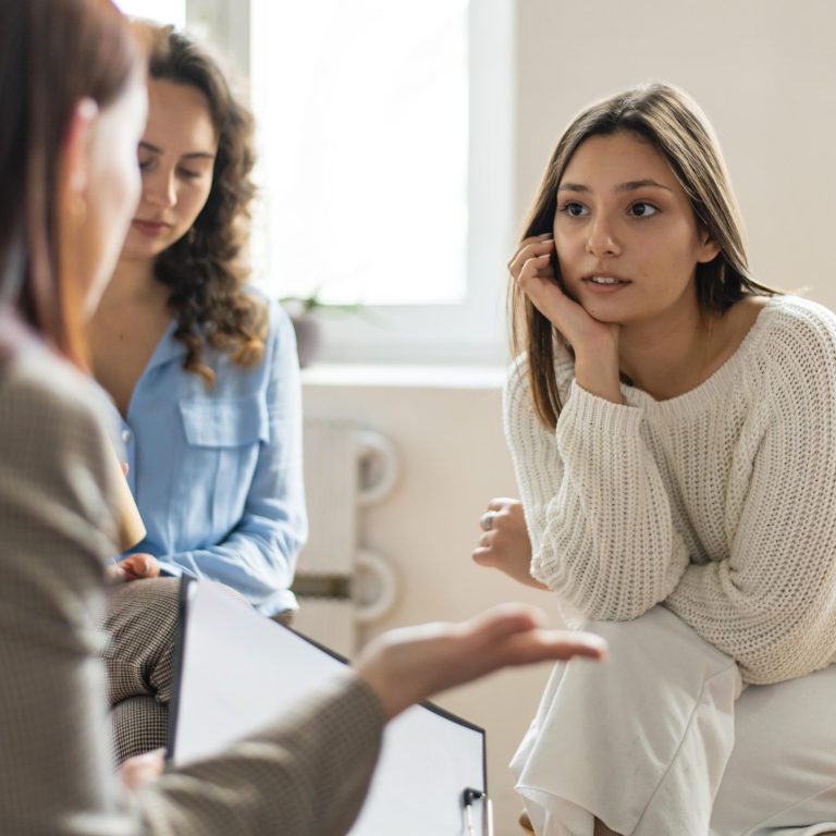 Psychological Evaluations For T-Visa Applicants (I-914) 2 medium shot women talking therapy scaled e1735318751651