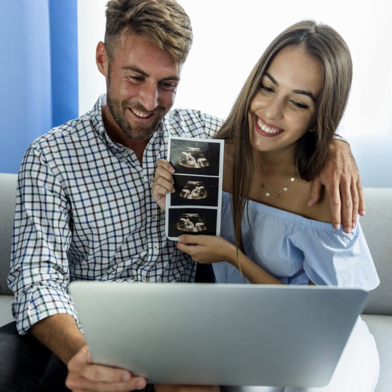 young couple having videoconference scaled e1715805786637